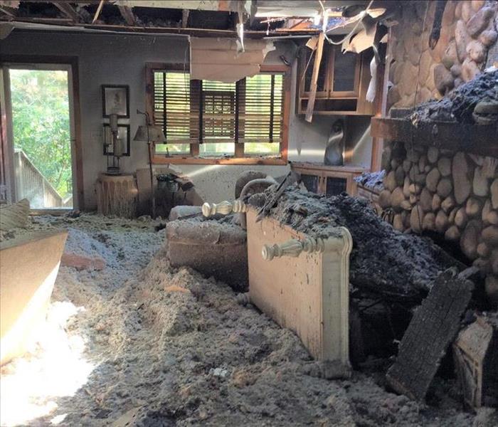 Living room with debris from fire