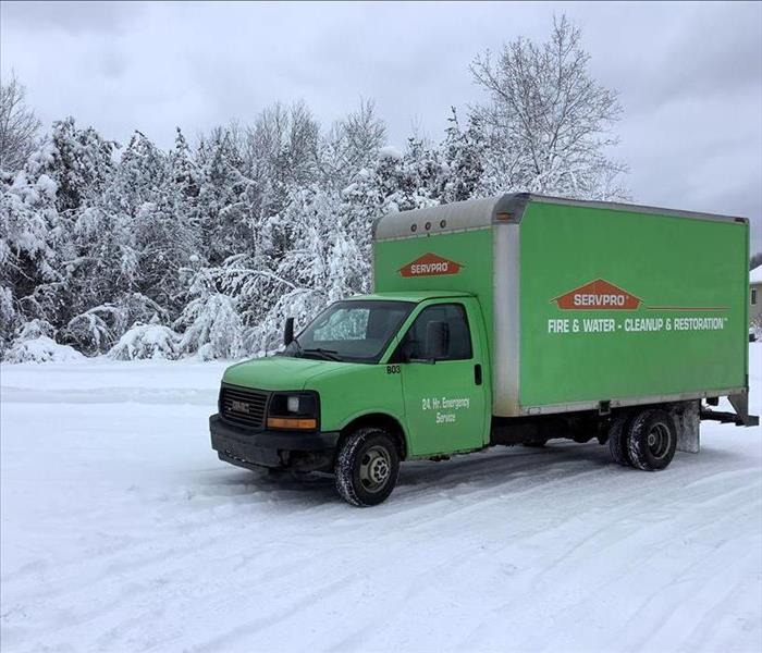 SERVPRO green box truck parked in snowy setting